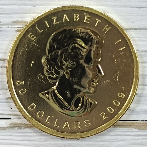 Золотая монета Кленовый лист 1 унция  Петертости.